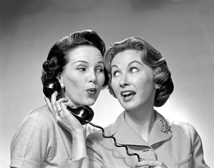 contact us- two women talking on the phone