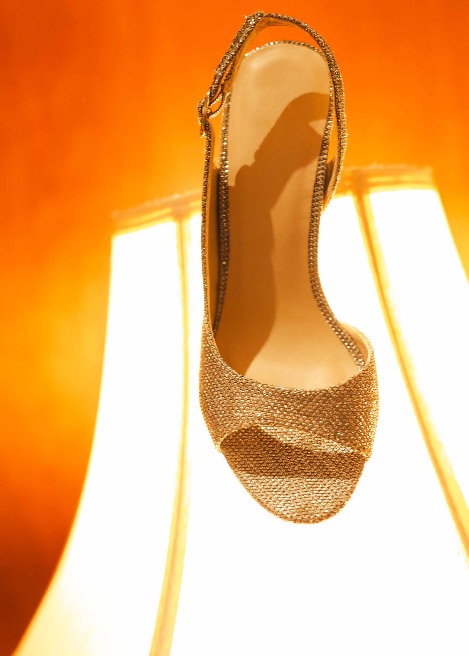 bride shoe on light fixture