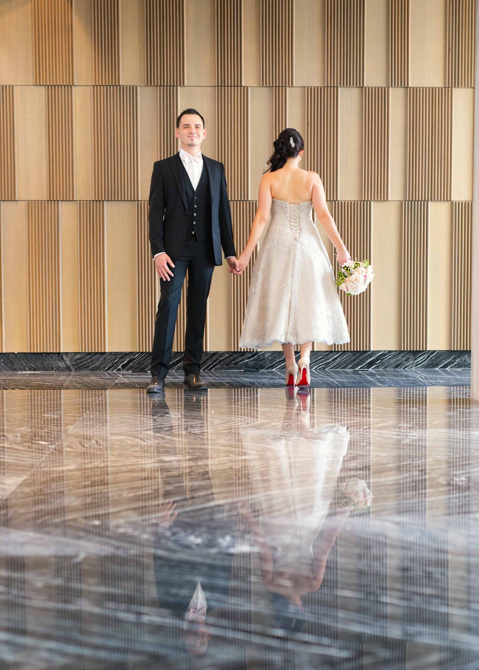 bride wearing Manolo shoes with red bottom