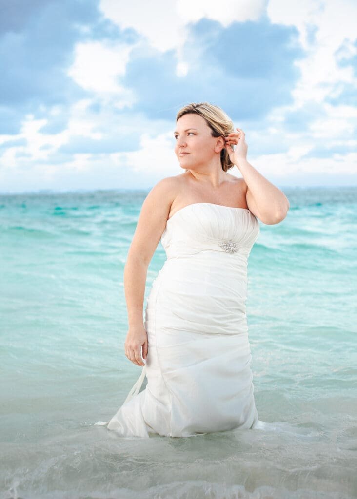 bride walking out of the ocean